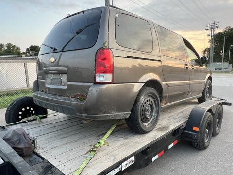 SMASH Cars Canada | Chevrolet Minivan on Trailer for Scrap Car Removal
