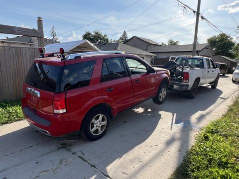 SMASH Cars Canada | Red Saturn Vue Junk Car for Scrap Metal Recycling